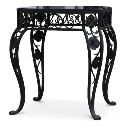 Wrought iron table / bedside table with black glass top.